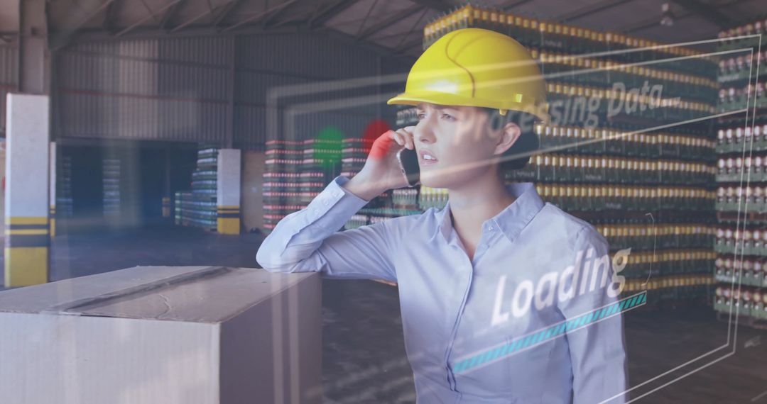 Businesswoman in Warehouse Analyzing Data with Smart Technology