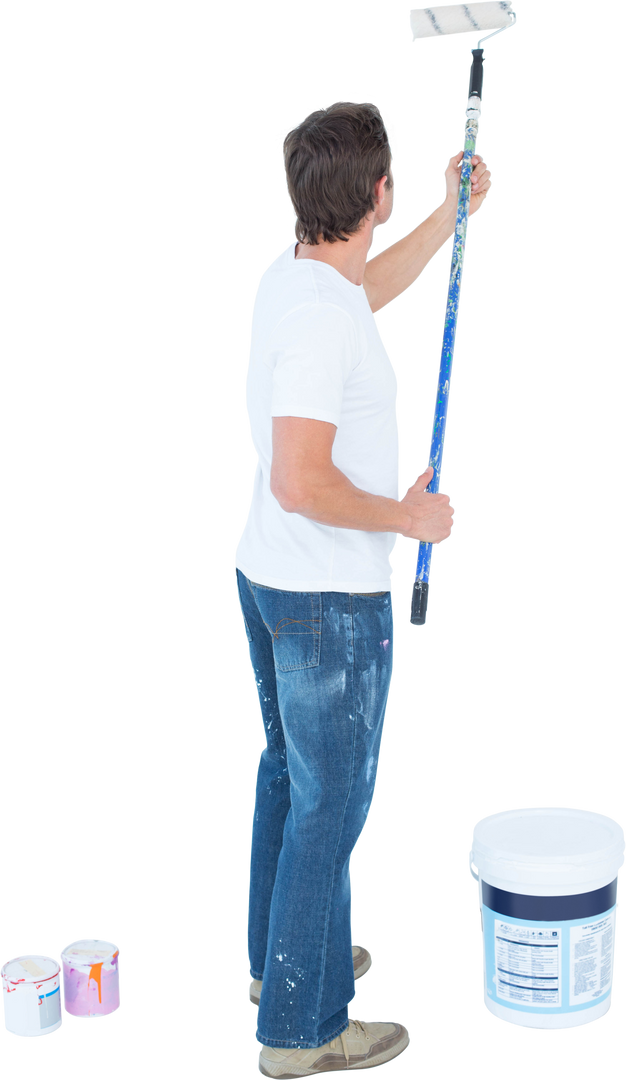 Side View of Man Painting Wall with Paint Roller in Casual Attire on Transparent Background - Download Free Stock Images Pikwizard.com