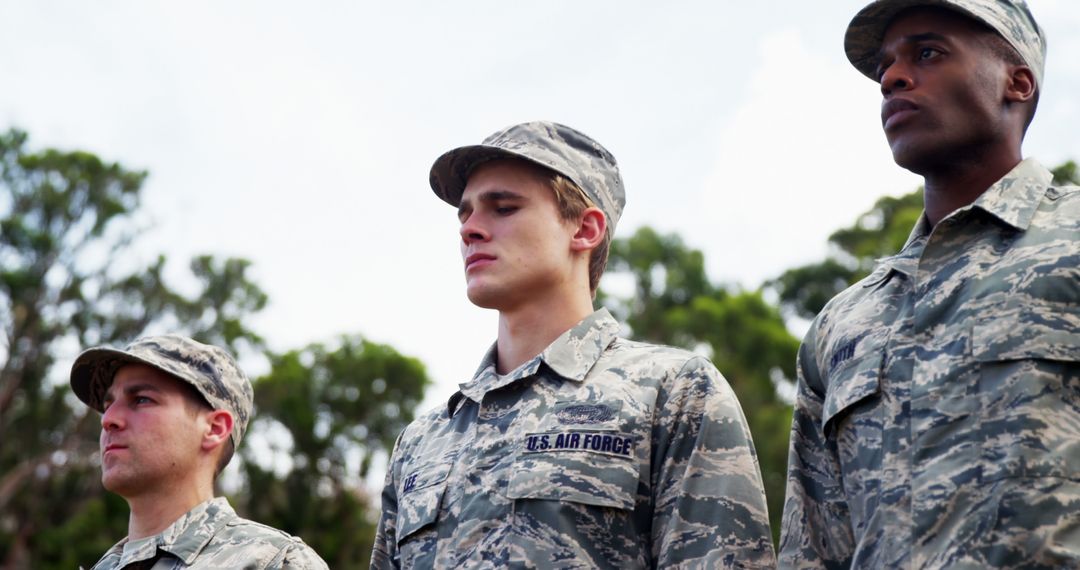 Group of US Air Force Soldiers Standing in Camouflage Uniforms Outdoors - Free Images, Stock Photos and Pictures on Pikwizard.com