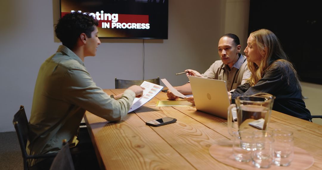 Diverse Professionals Discussing in Modern Conference Room
