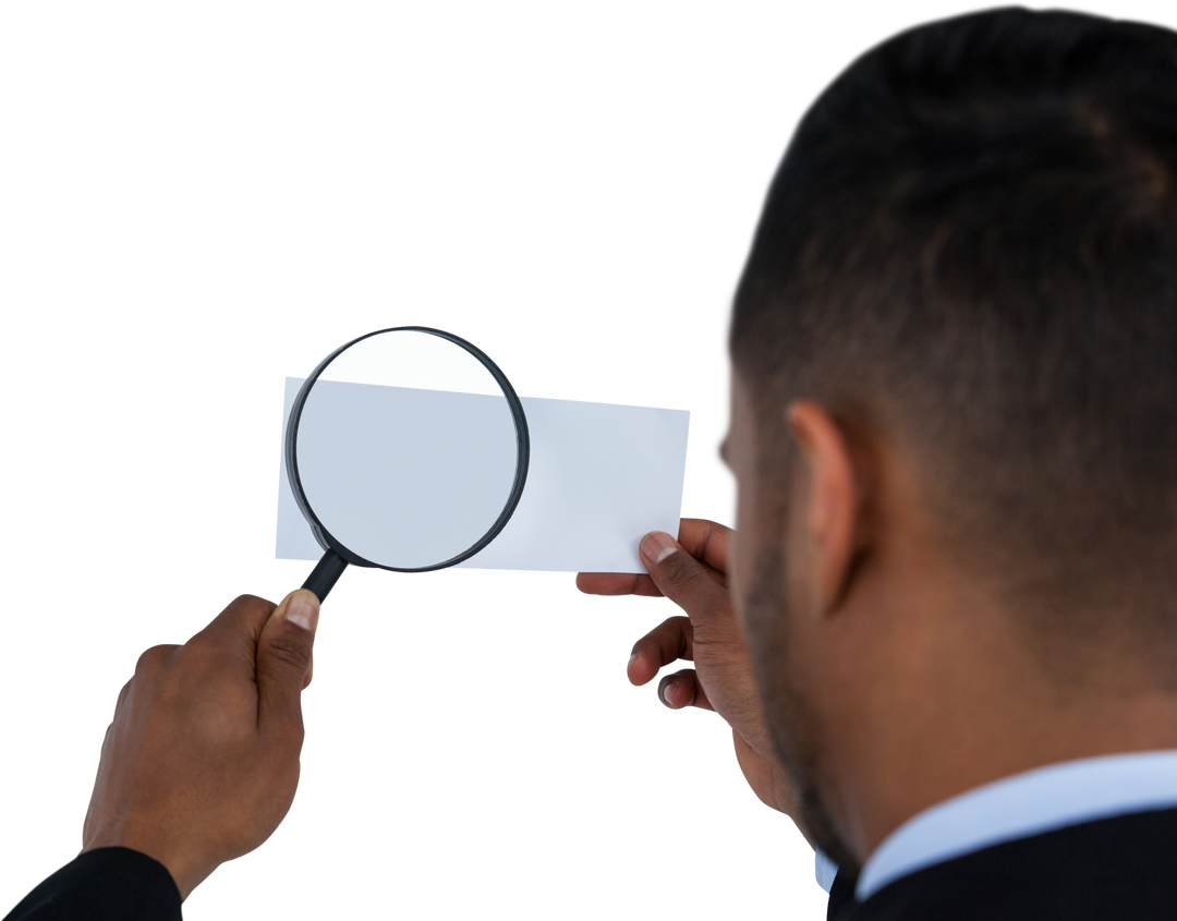 Rear View of Man Using Magnifying Glass on Holed Transparent Paper - Download Free Stock Images Pikwizard.com