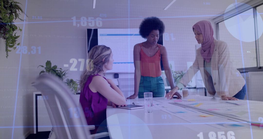 Diverse Business Colleagues Analyzing Financial Data in Office