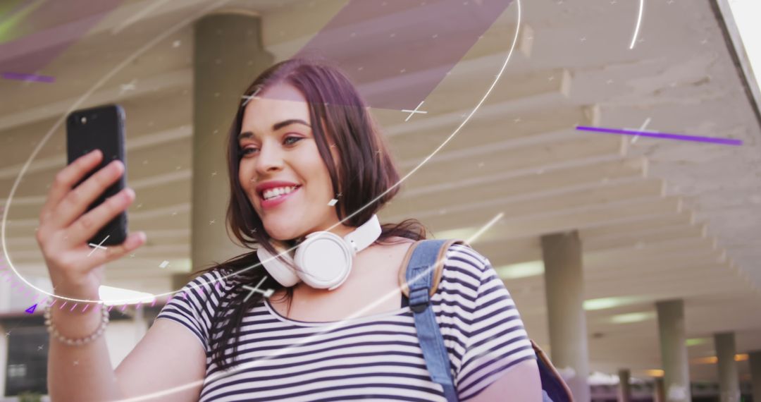 Smiling Woman Using Smartphone with Digital Processing Overlays