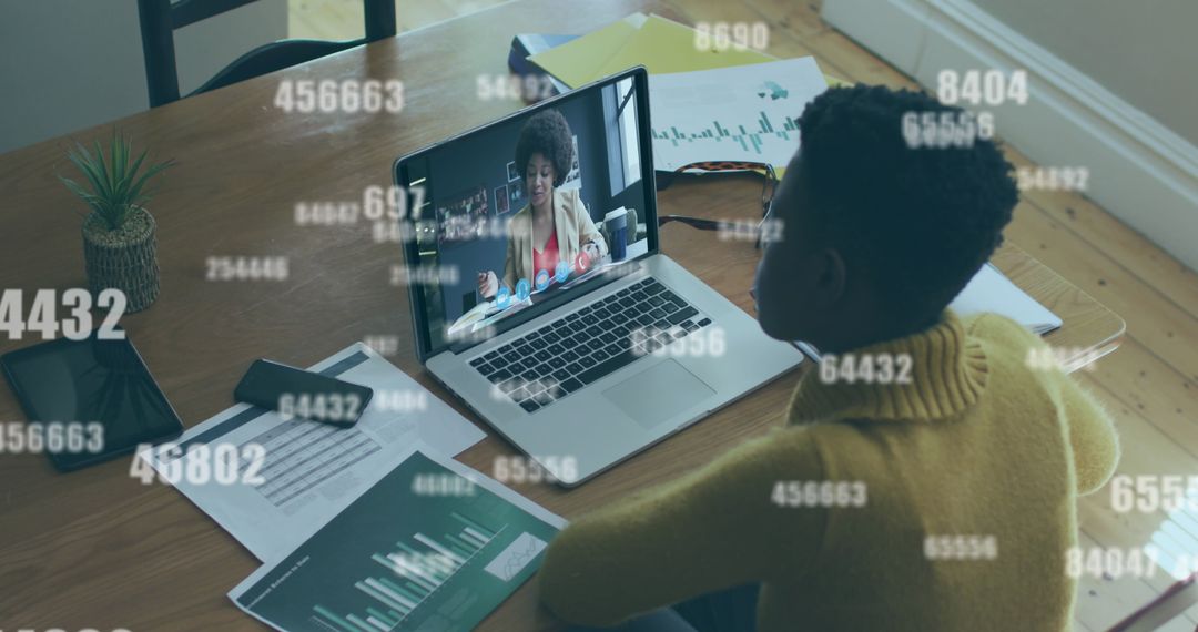 Virtual Business Meeting with Data Overlay on Laptop