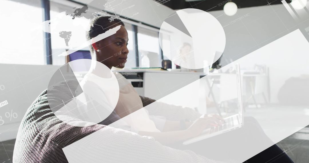 Focused Woman Typing on Laptop in Modern Office Environment