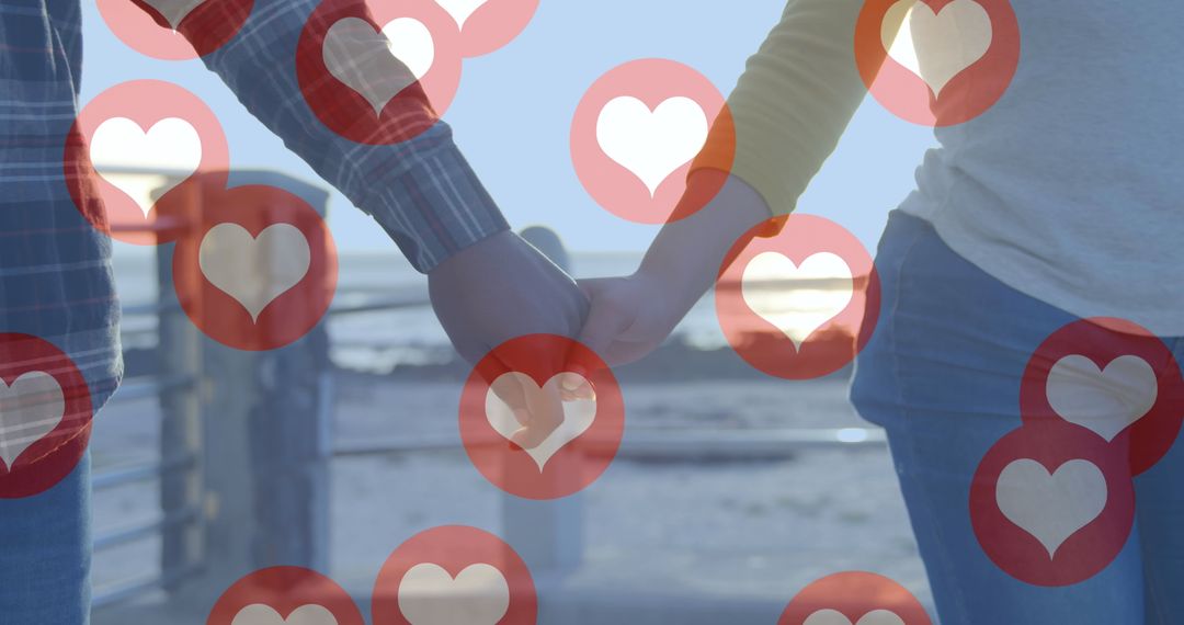 Couple Holding Hands with Heart Icons by Seaside