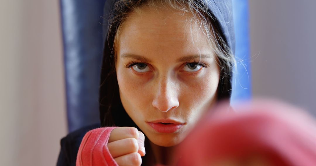 Determined Female Boxer Training with Focus - Free Images, Stock Photos and Pictures on Pikwizard.com