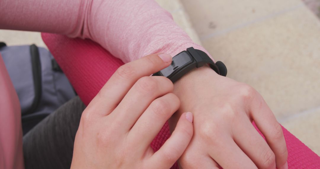 Closeup of person using smartwatch fitness tracker during workout - Free Images, Stock Photos and Pictures on Pikwizard.com