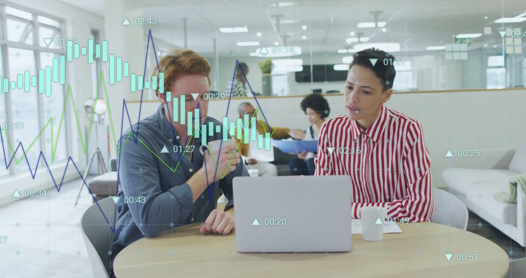 Business Team Analyzing Financial Data Insights in Modern Office