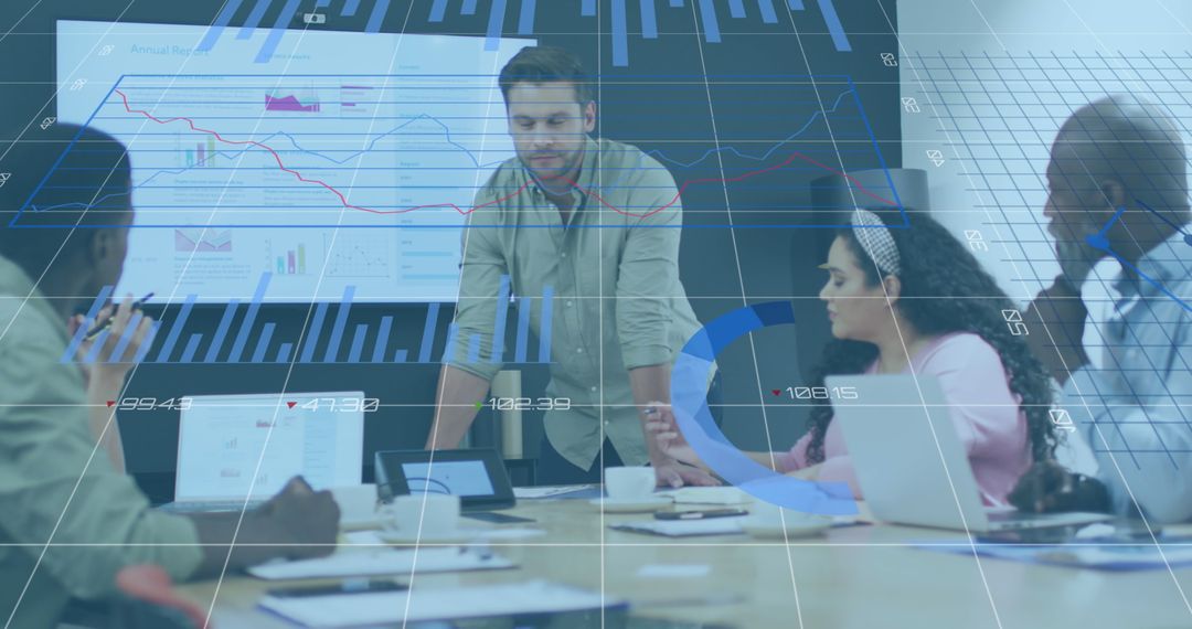Business Team Analyzing Financial Graphs in Meeting Room
