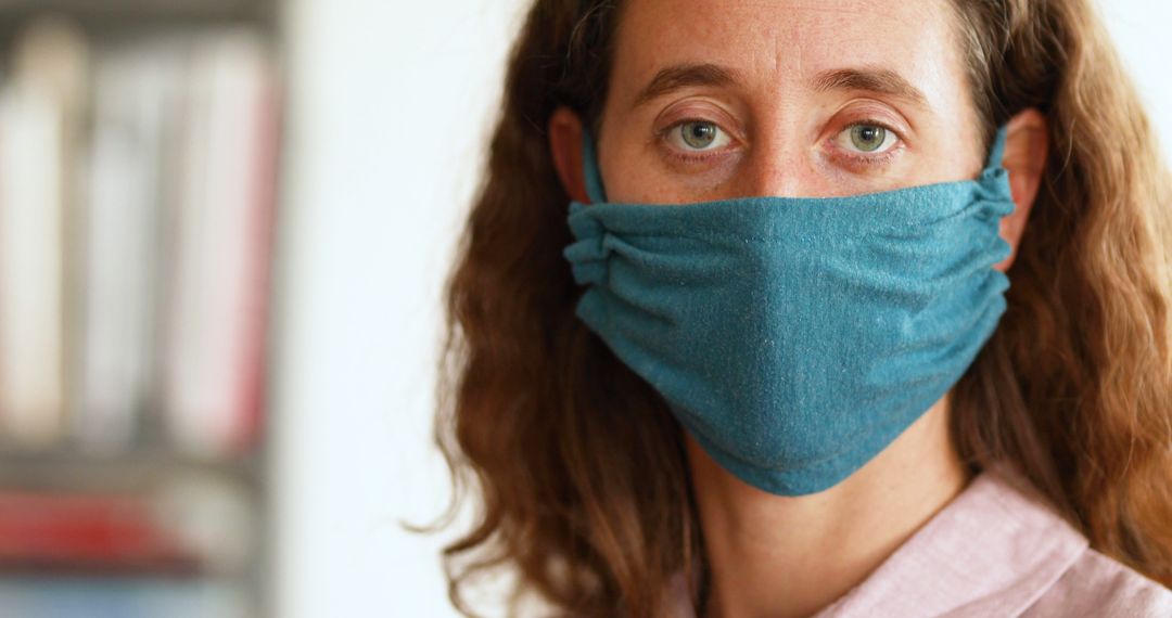 Woman Wearing Face Mask Looking Concerned - Free Images, Stock Photos and Pictures on Pikwizard.com