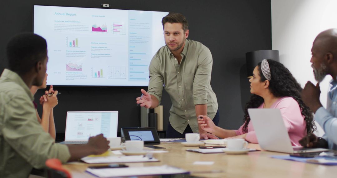 Professional Presenting Key Data in Office Meeting Room