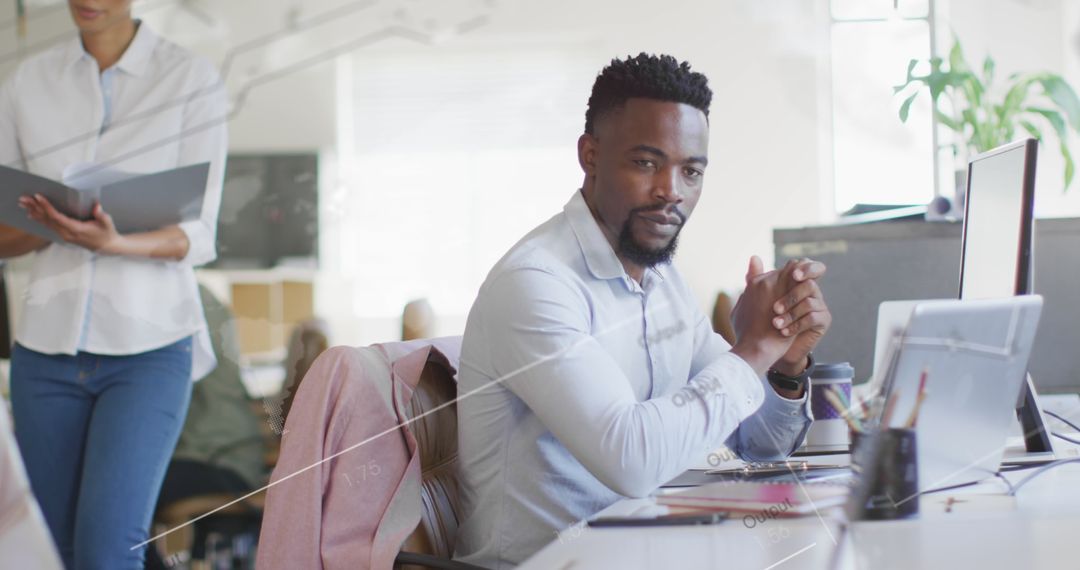 Focused African American Businessman Working at Office Desk