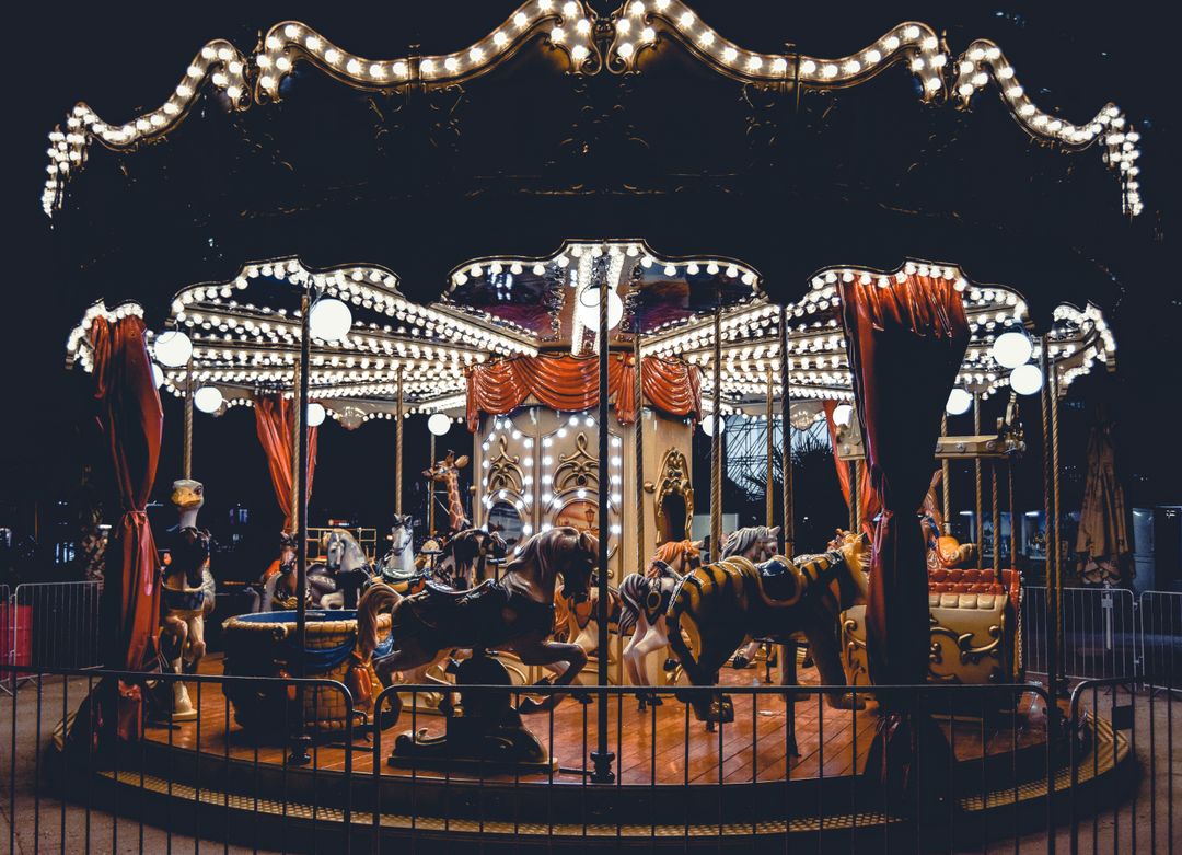 Vintage Carousel Glowing in Night Fairground