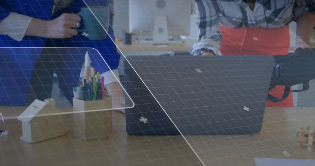 Collaborative Work in Modern Office with Laptops and Technology