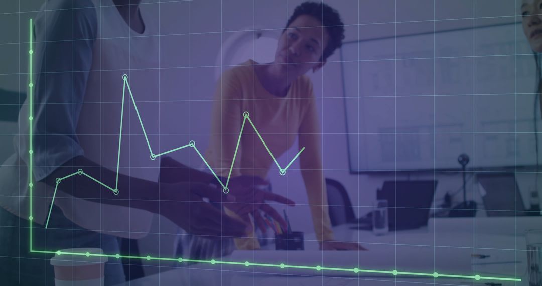 Diverse Team Analyzing Financial Trends in Office Setting