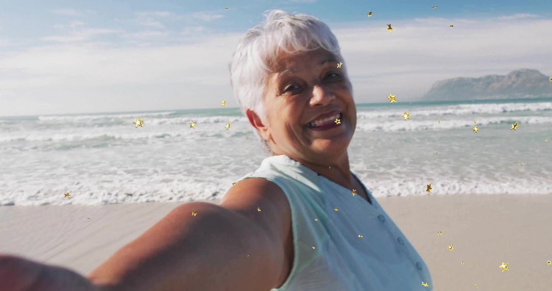 Joyful Senior Woman Enjoying Beach Day with Sparkles