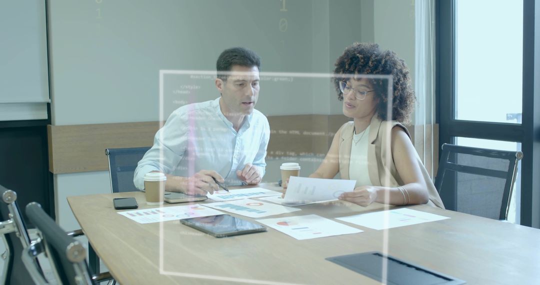 Professional Collaboration with Data Visualization in Modern Office