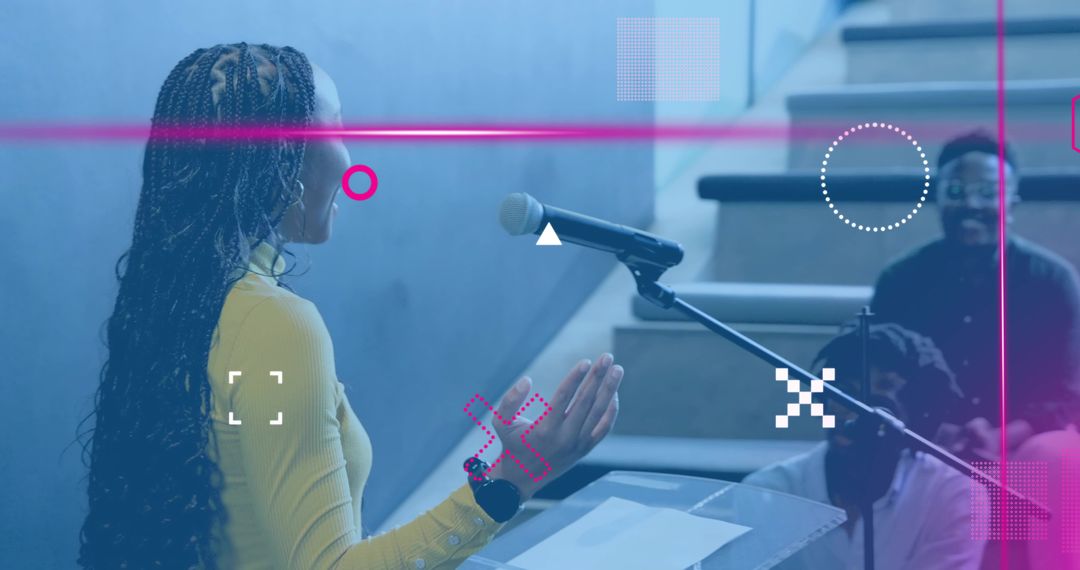 Young woman speaking at podium, addressing audience on stair seating with mic and notes