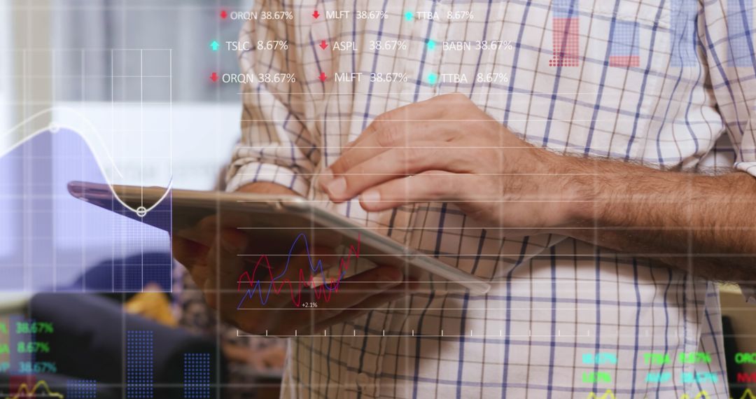 Businessman Analyzing Financial Trends on Digital Tablet