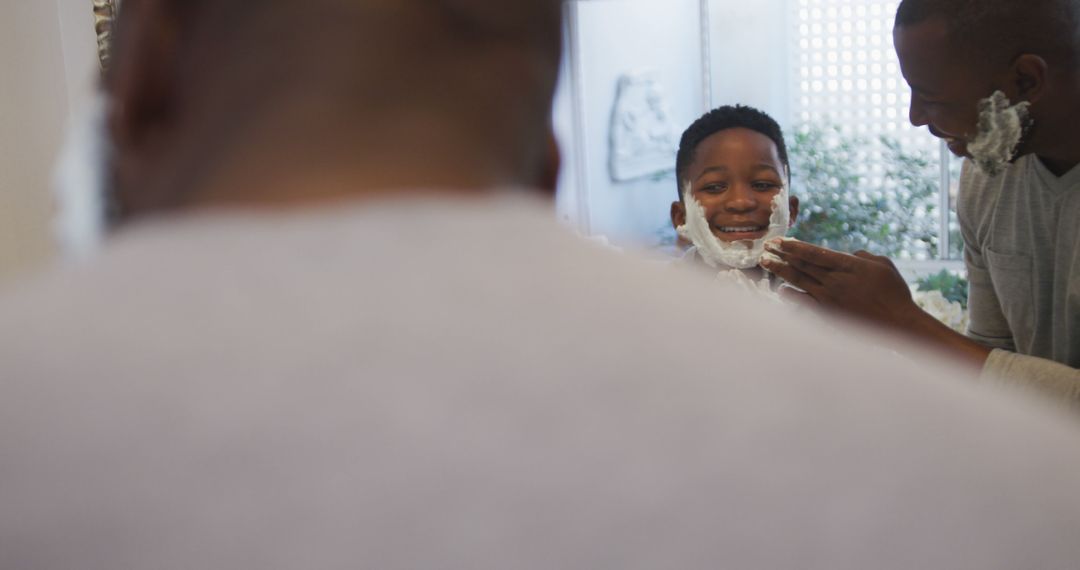 Father Teaching Young Son How to Shave in Bathroom Mirror - Free Images, Stock Photos and Pictures on Pikwizard.com