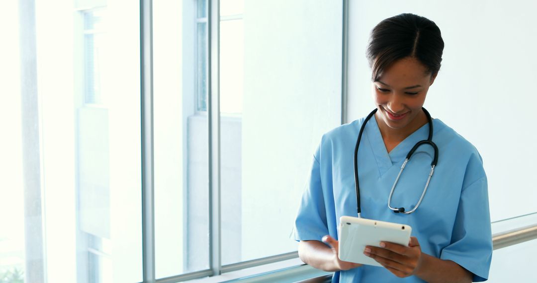 Nurse Using Digital Tablet for Patient Records - Free Images, Stock Photos and Pictures on Pikwizard.com