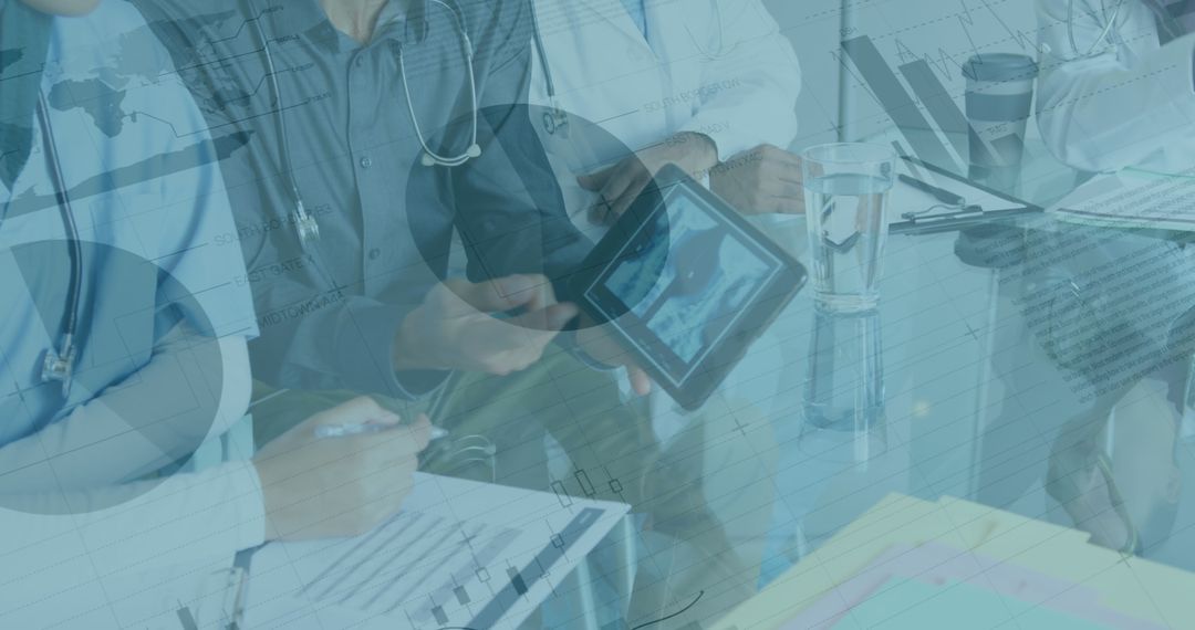 Healthcare Professionals Analyzing Financial Data with Technology