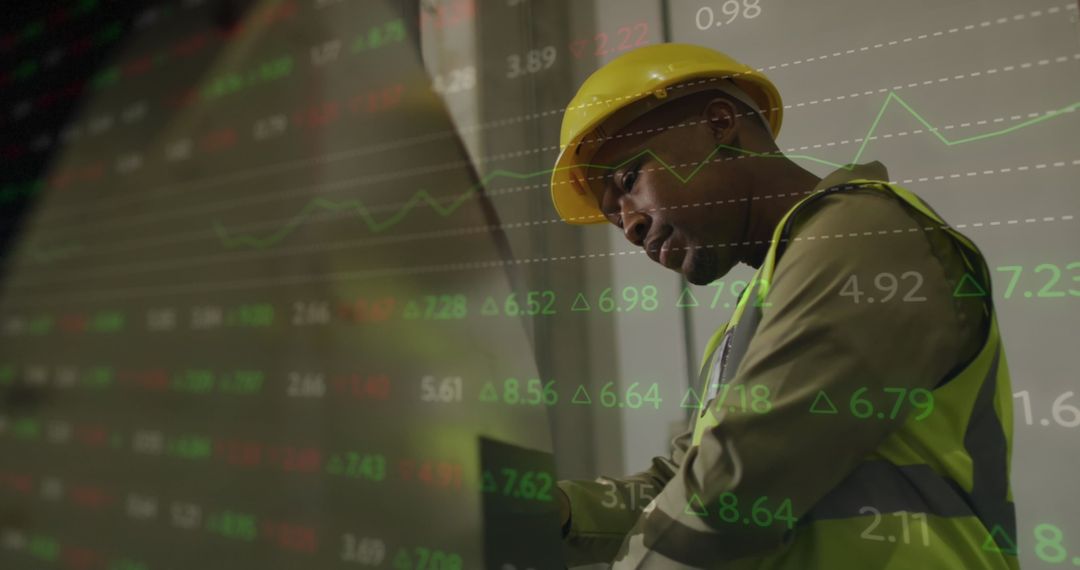 Warehouse Worker Analyzing Digital Statistics