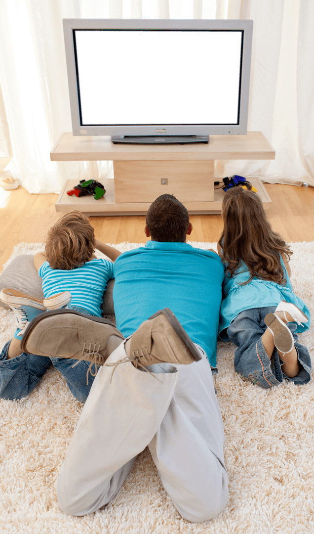 Family Relaxing on Rug Watching Transparent TV Screen