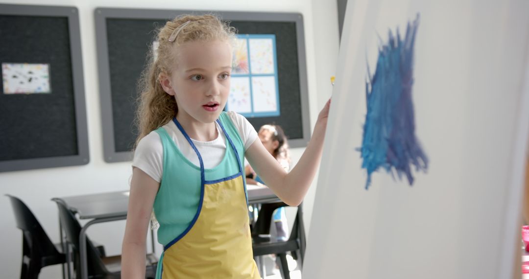 Surprised Young Artist Creating Painting in Art Class