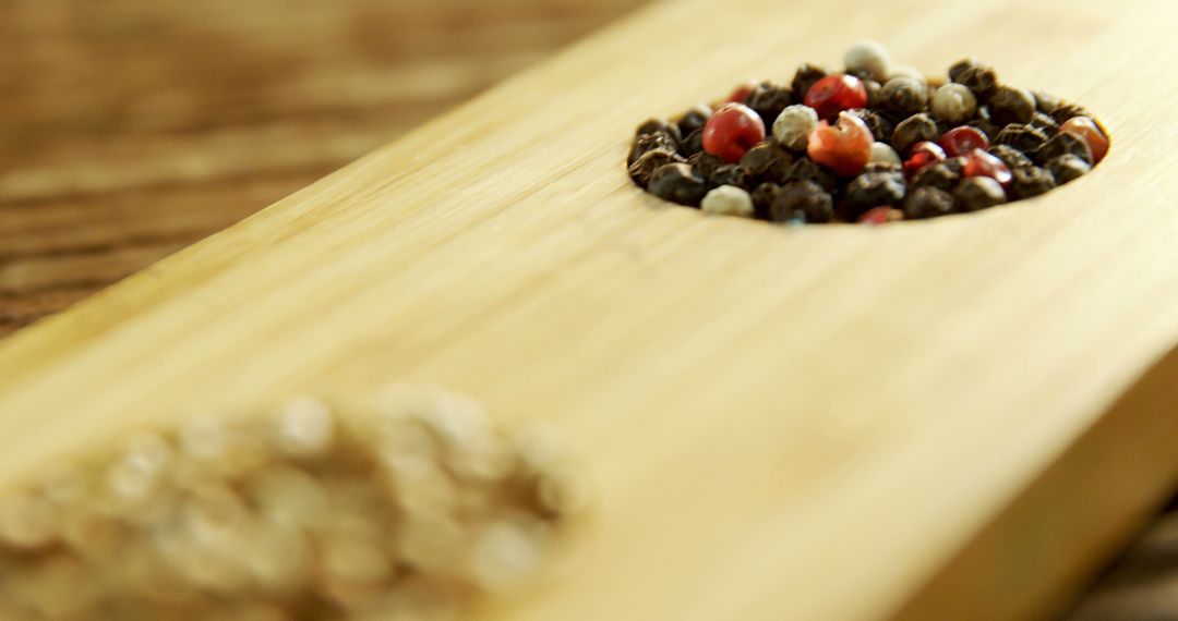 Assorted Peppercorns on a Wooden Serving Board - Free Images, Stock Photos and Pictures on Pikwizard.com