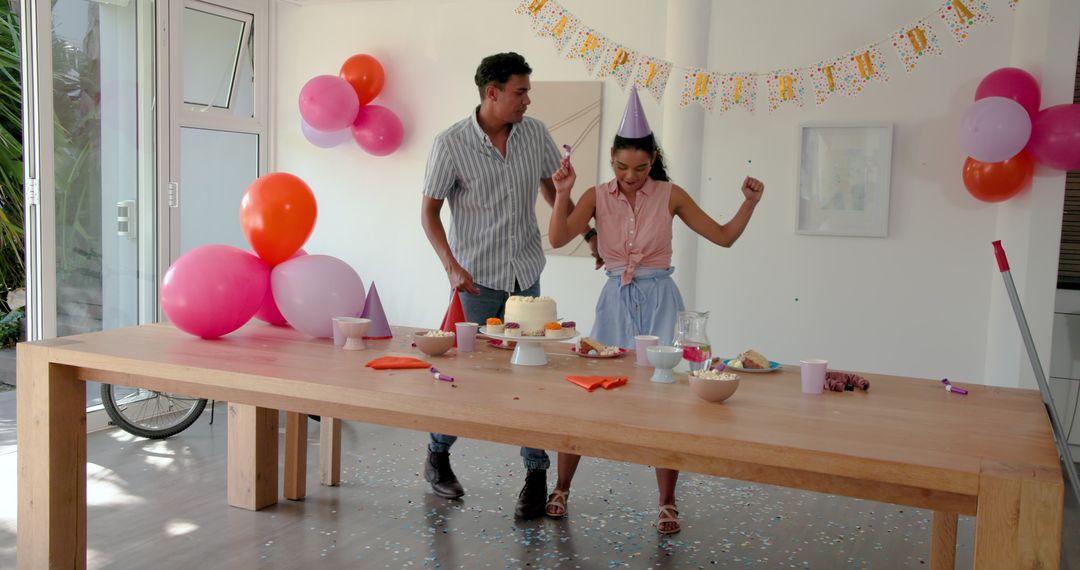 Joyful Birthday Party Preparation with Cake and Balloons