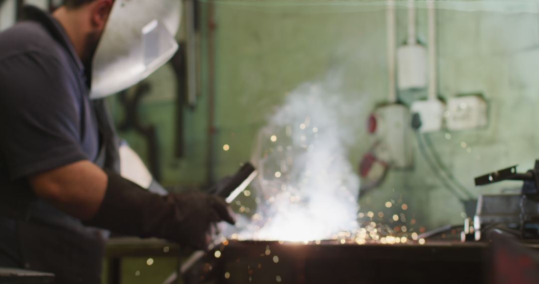 Metalworker Welding in Industrial Workshop - Free Images, Stock Photos and Pictures on Pikwizard.com