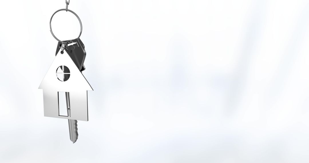 Silver House Key with Home-Shaped Keychain on White Background - Free Images, Stock Photos and Pictures on Pikwizard.com