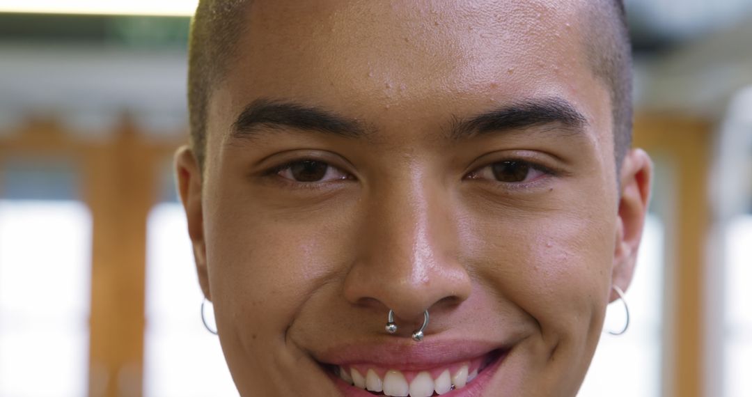 Close-up of Smiling Young Person with Nose Piercing - Free Images, Stock Photos and Pictures on Pikwizard.com