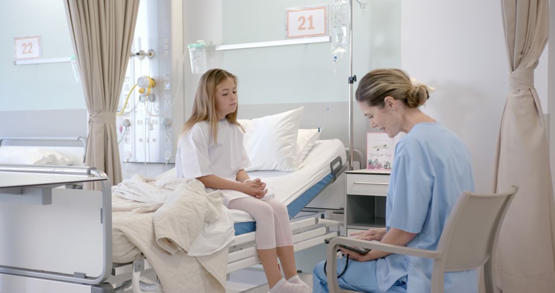 Young Female Patient Receiving Consultation from Healthcare Professional in Hospital Room - Free Images, Stock Photos and Pictures on Pikwizard.com