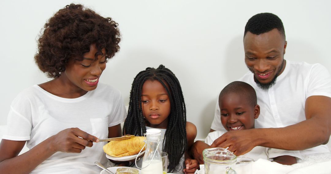 Happy African Family Enjoying Breakfast at Home - Free Images, Stock Photos and Pictures on Pikwizard.com