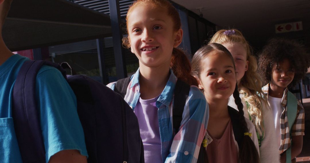 Diverse Schoolchildren Smiling in a Line at School