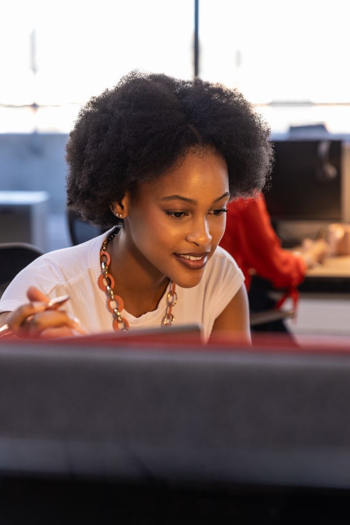 Creative Professional Working on Graphic Design with Stylus