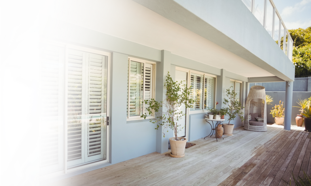 Transparent Patio Balcony with ShutteredWindows and Plant Decor - Download Free Stock Images Pikwizard.com