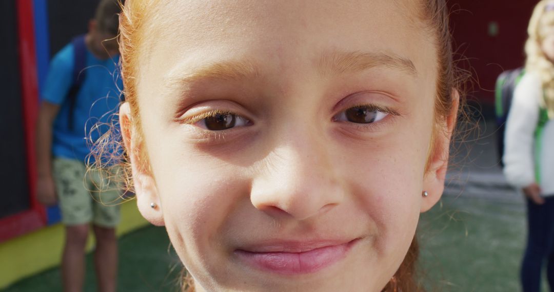 Close-Up Portrait of Smiling Child Outdoors - Free Images, Stock Photos and Pictures on Pikwizard.com