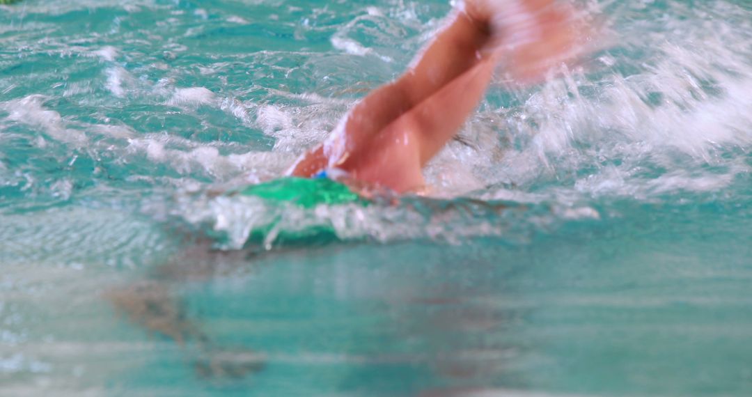 Swimmer Doing Freestyle Stroke in Pool with Splash - Free Images, Stock Photos and Pictures on Pikwizard.com