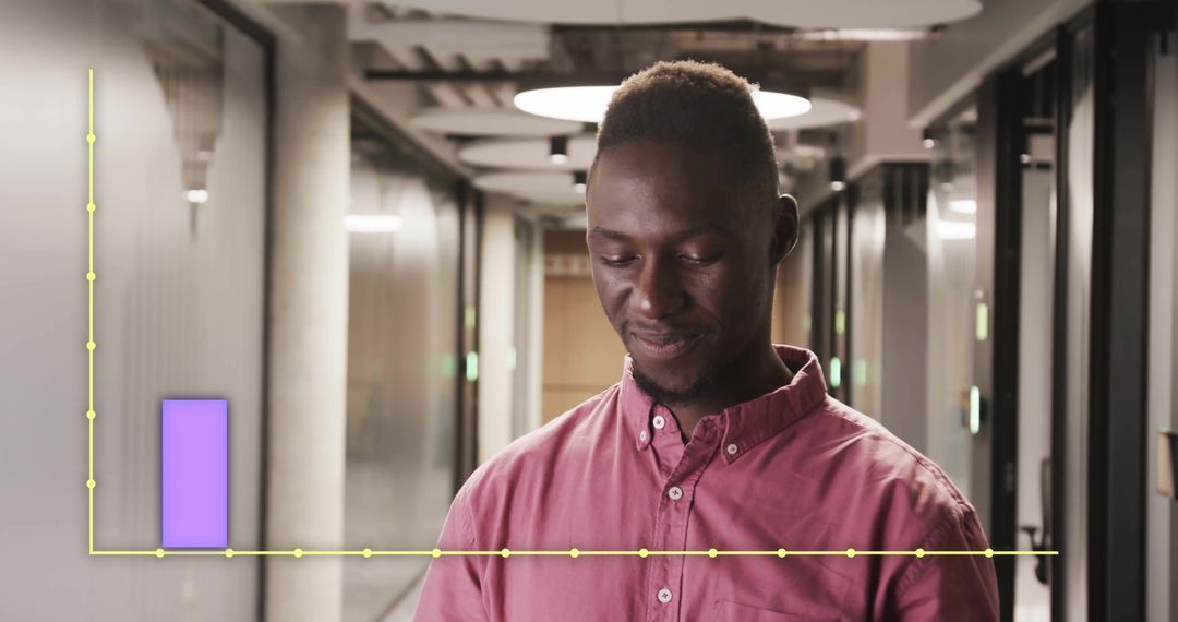Businessman Analyzing Data Visualization in Modern Office Corridor