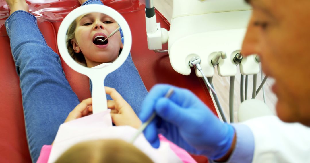 Child at Dentist Office Receiving Dental Exam - Free Images, Stock Photos and Pictures on Pikwizard.com