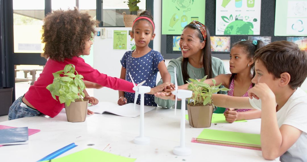 Teacher and Students Discussing Renewable Energy Projects