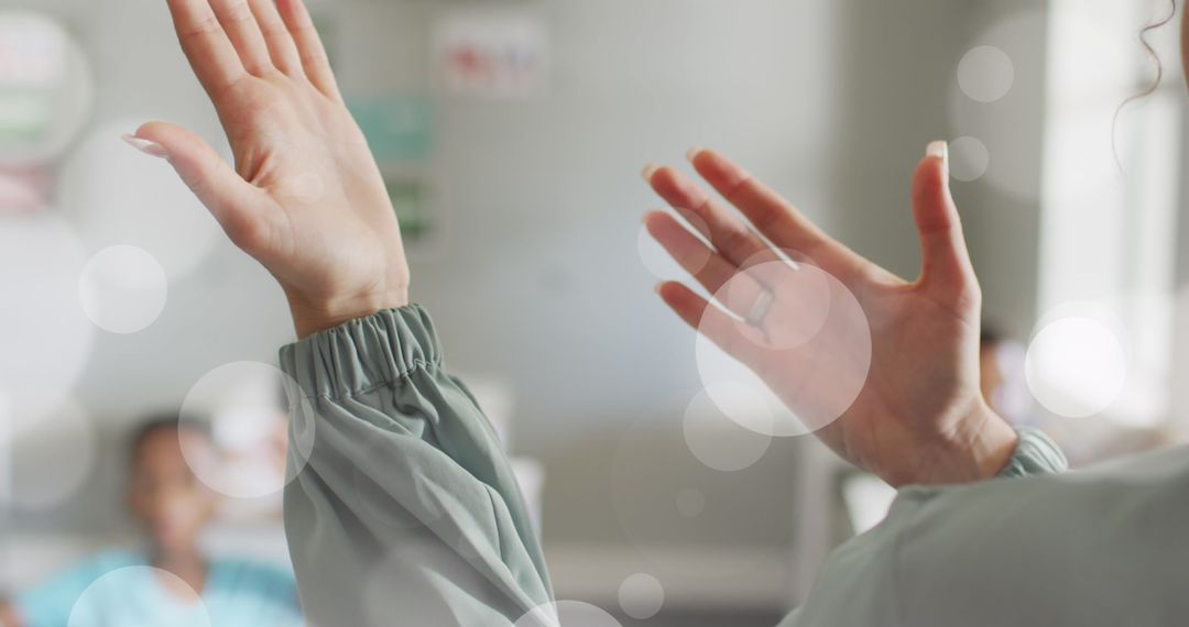 Inspiring Teacher Engaging with Students in Classroom