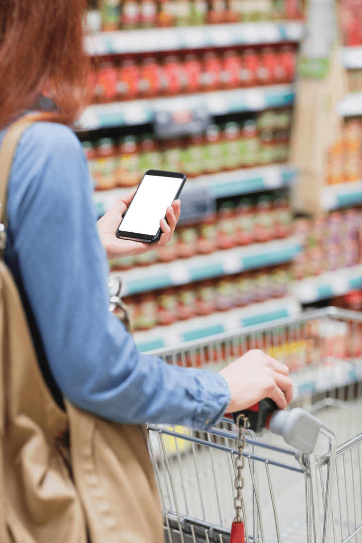 Transparent Screen Smartphone in Woman's Hand at Supermarket Aisle