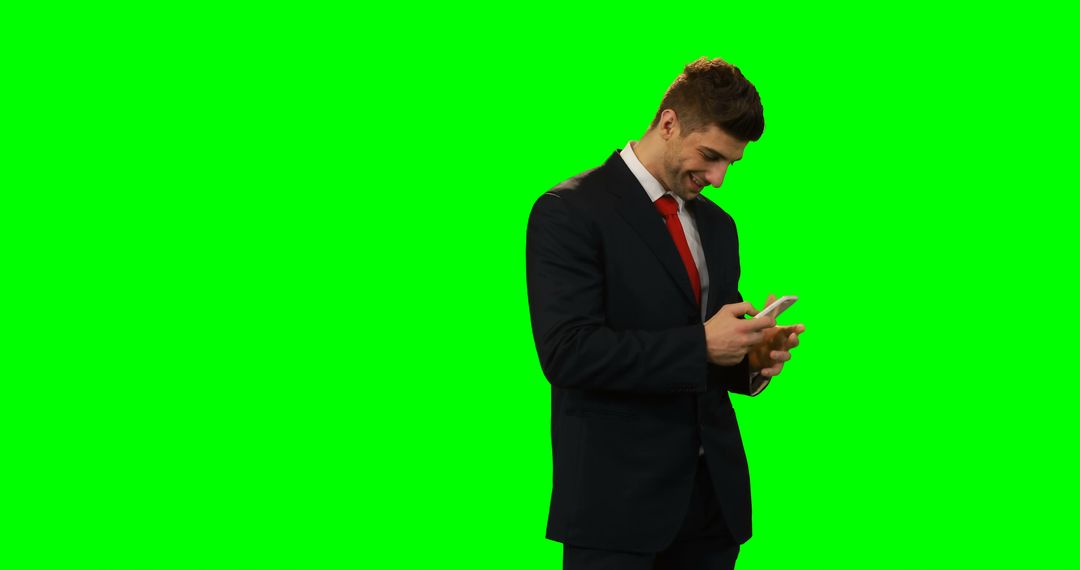 Businessman Using Smartphone on Bright Green Background - Free Images, Stock Photos and Pictures on Pikwizard.com