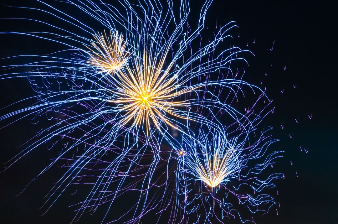 Vibrant Fireworks Exploding Against Night Sky during Celebration - Free Images, Stock Photos and Pictures on Pikwizard.com
