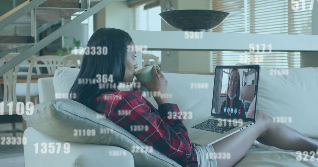 Woman Video Calling from Home with Digital Data Streaming Overlay